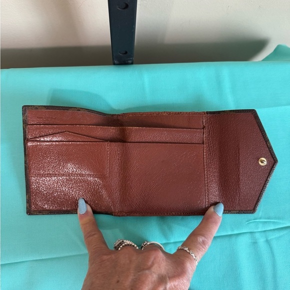 Louis Vuitton Double. Snap Monogram Wallet - Picture 11 of 14